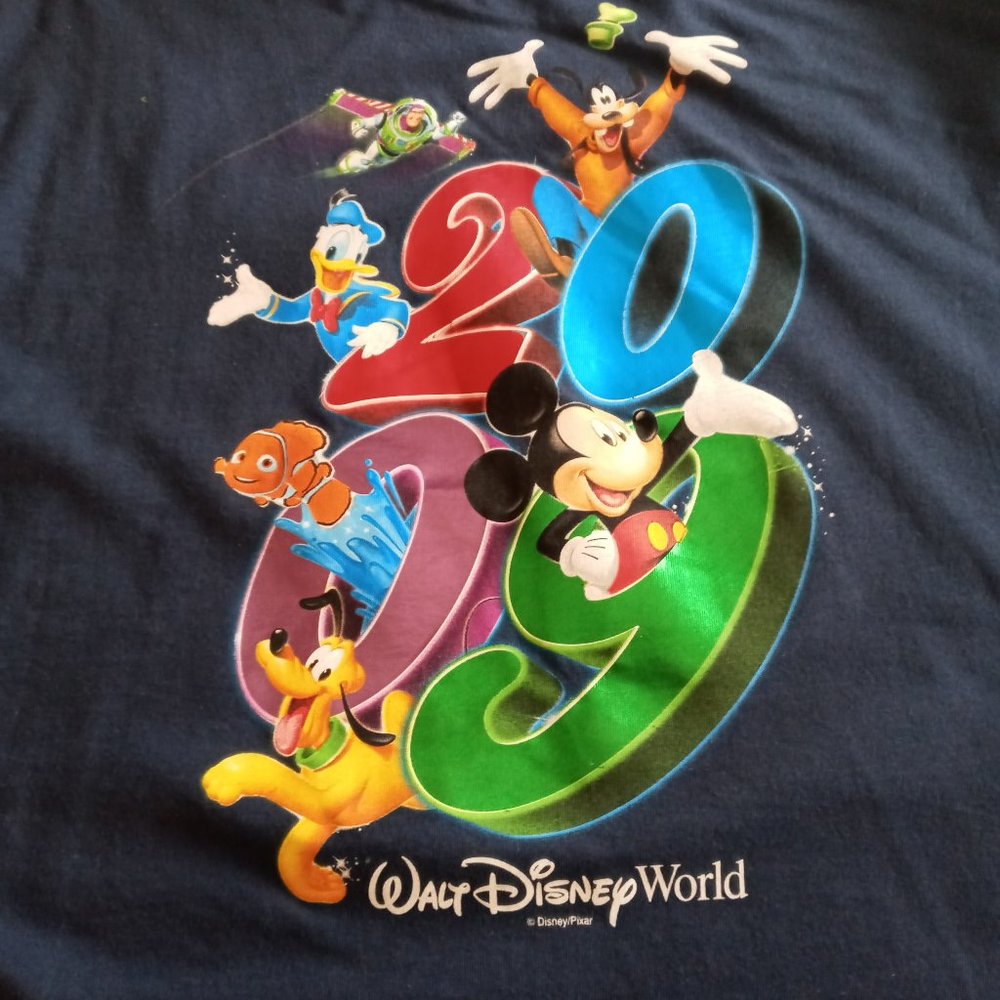 WALT DISNEY WORLD BNWT MENS 2009 BLUE T SHIRT SZ XL - Picture 1 of 3